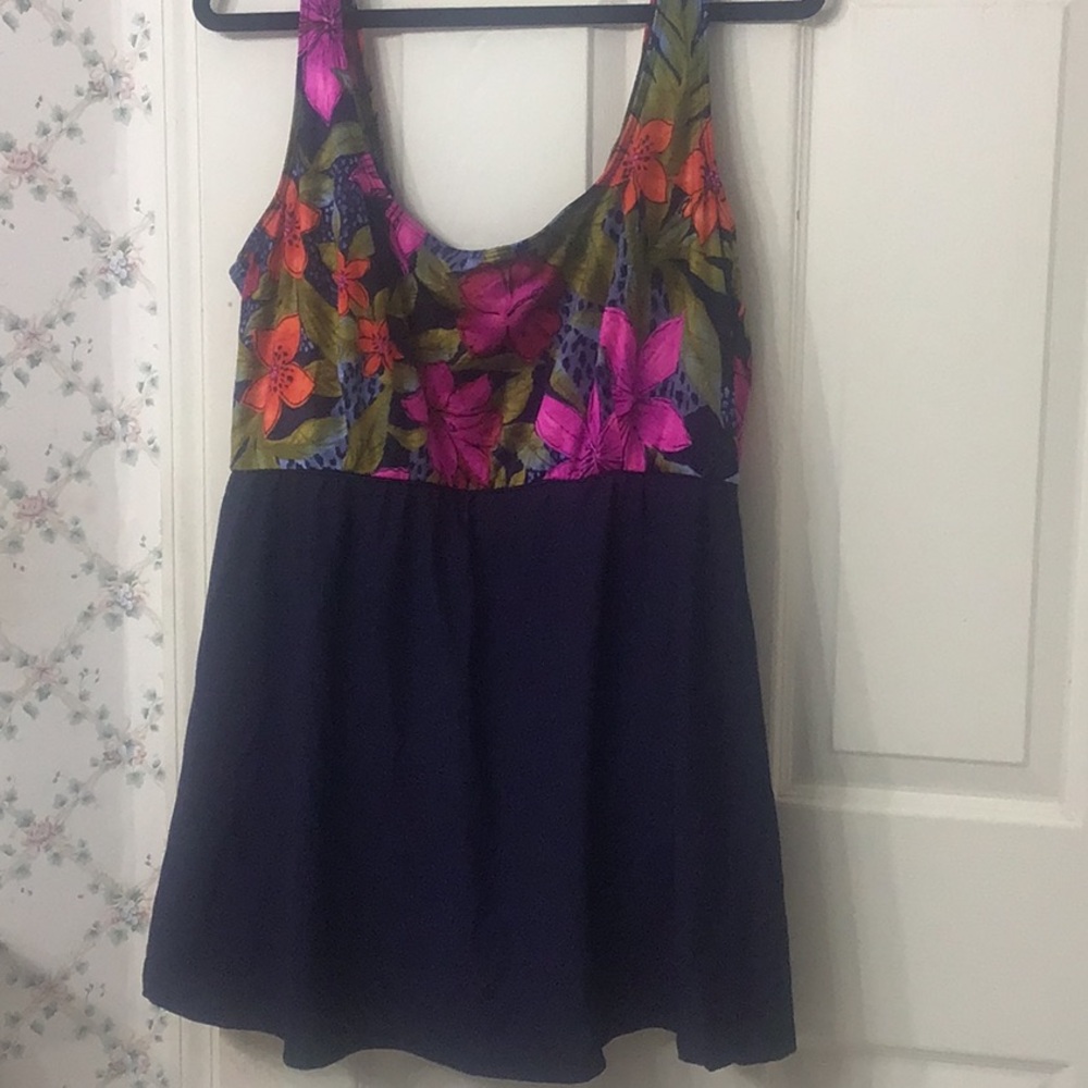 Plus size 28 W black & red flower print one piece swim suit. Length is 32”.